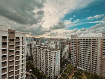 Buildings in city against sky