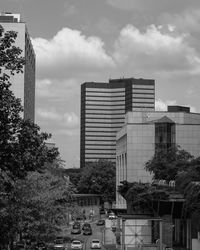 Buildings in city against sky