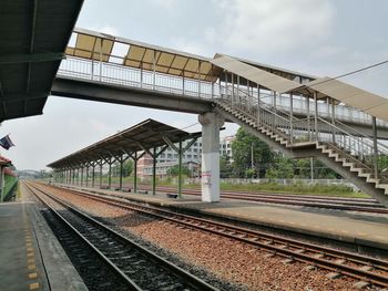 Railroad station platform against sky