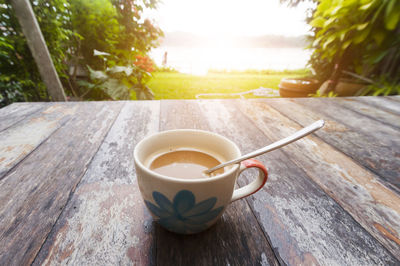 Close-up of coffee cup on table