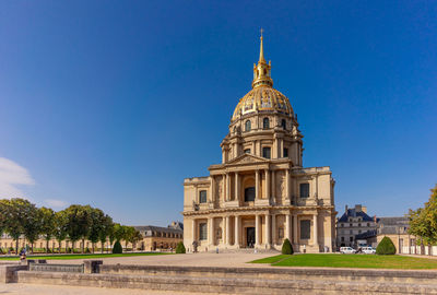 View of historic building against clear blue sky