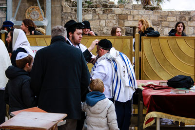 People standing in town square