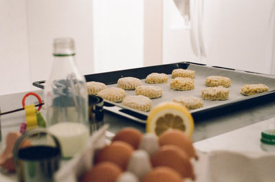 Scones in tray on table at home