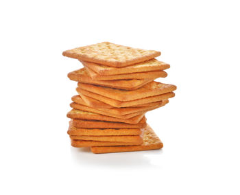 Close-up of cookies against white background