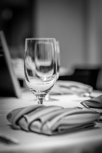 Close-up of beer glass on table