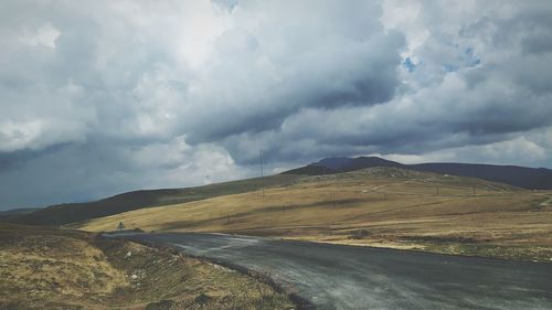 Scenic view of land against sky