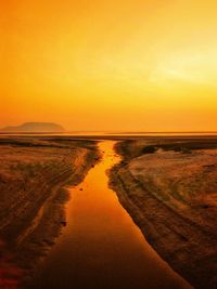 Scenic view of sea against sky during sunset