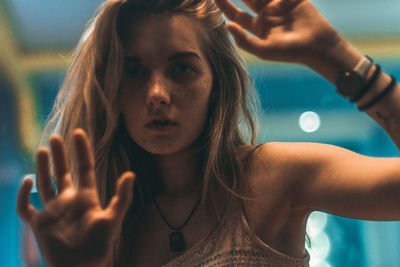 Close-up portrait of young woman