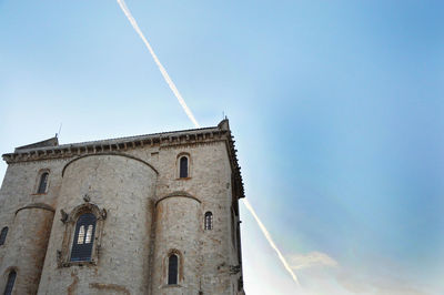 Low angle view of church against blue sky