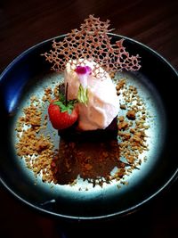 High angle view of cake in plate on table