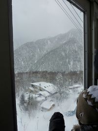 Scenic view of snow covered mountains