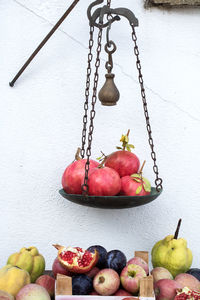 High angle view of fruits hanging on wood