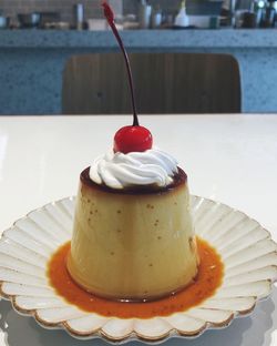 Close-up of cake served on table