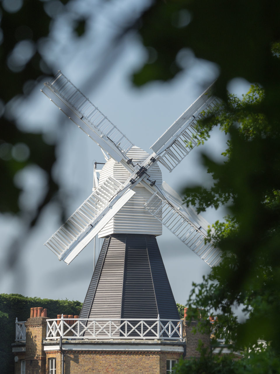 LOW ANGLE VIEW OF TRADITIONAL WINDMILL