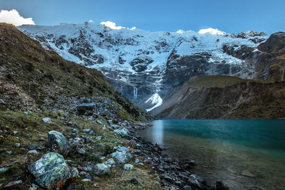 Scenic view of waterfall against sky