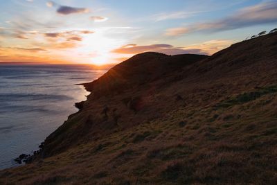 Scenic view of sea against sky during sunset