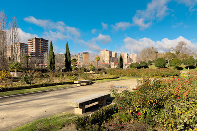 Buildings in city against sky