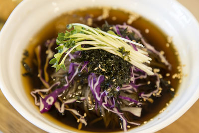 High angle view of noodle soup in bowl on table