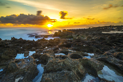 Scenic view of sea against sky during sunset