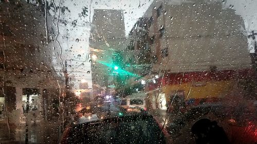 Close-up of wet window in rainy season