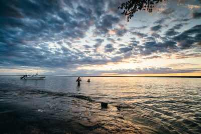 Scenic view of sea against sky during sunset