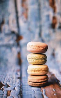 Macarons on wooden background