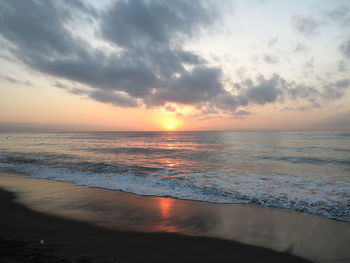 Scenic view of sea against sky during sunset