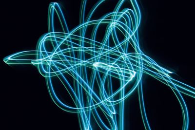 Light trails over black background