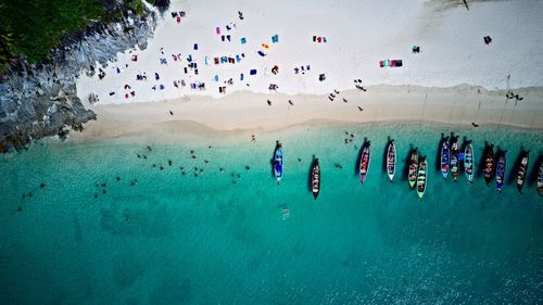 High angle view of people on sea shore