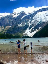 Scenic view of lake with mountains in background