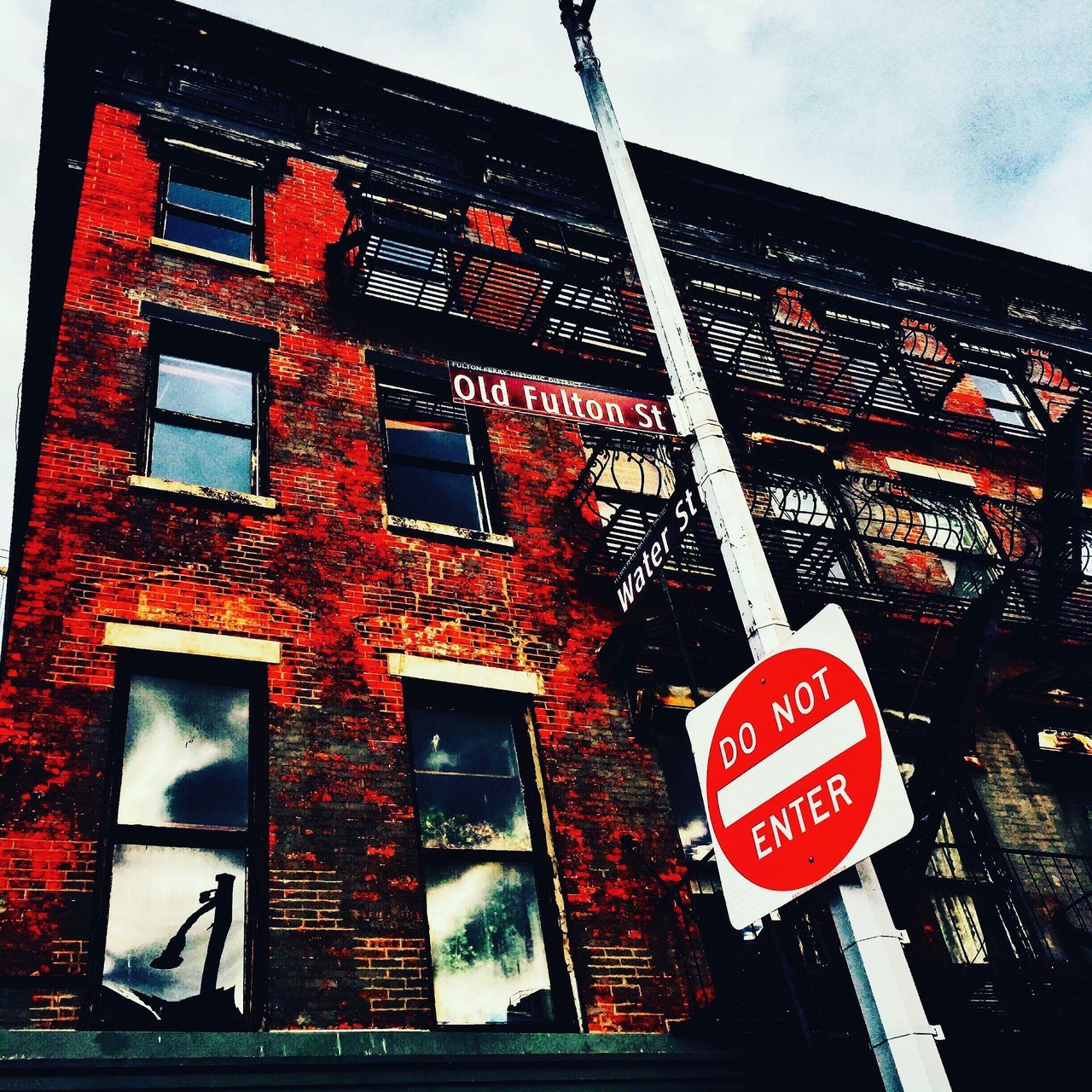 LOW ANGLE VIEW OF ROAD SIGN