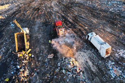 Landfill waste disposal. garbage dump with waste plastic. garbage truck unload rubbish in landfill. 
