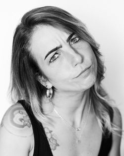 Close-up portrait of smiling young woman