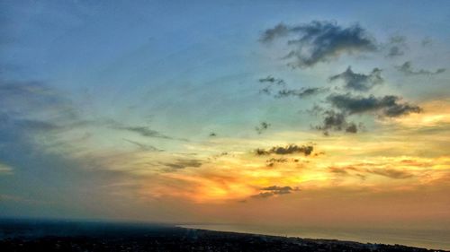Scenic view of dramatic sky over sea