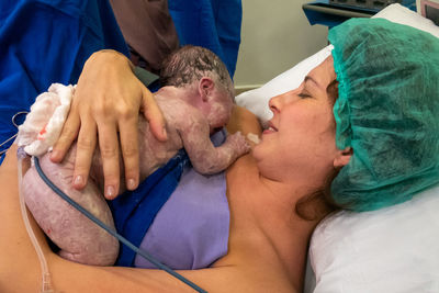 Mother daughter shortly after birth at hospital.