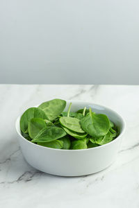 White culinary background with ingredients for making salad