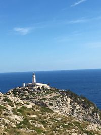 Scenic view of sea against blue sky