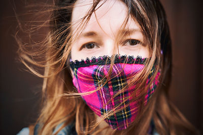 Close-up of woman wearing mask