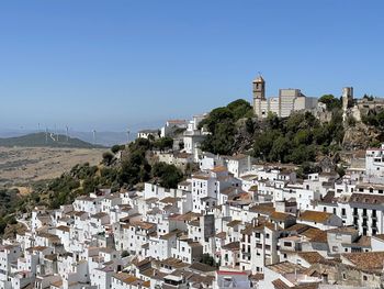 The white village of casares in southern spain against clear blue sky