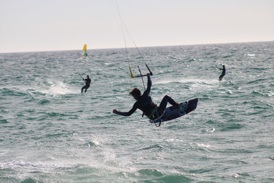 Kite surfer jumping