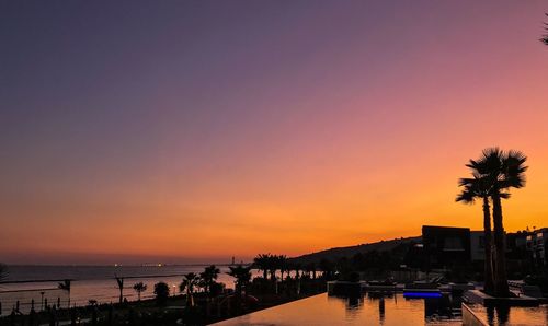 Scenic view of beach at sunset