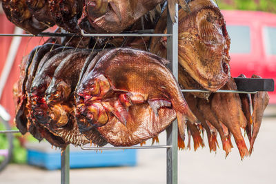 Various dry smoked spiced fish ready to eat in a fish market