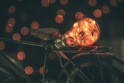 Close-up of illuminated lighting equipment