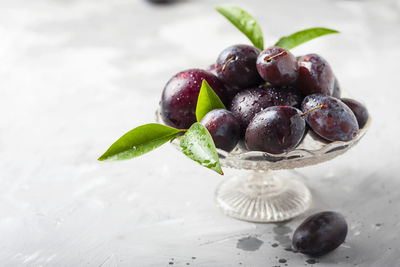 Close-up of grapes on table