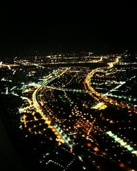 Aerial view of city at night