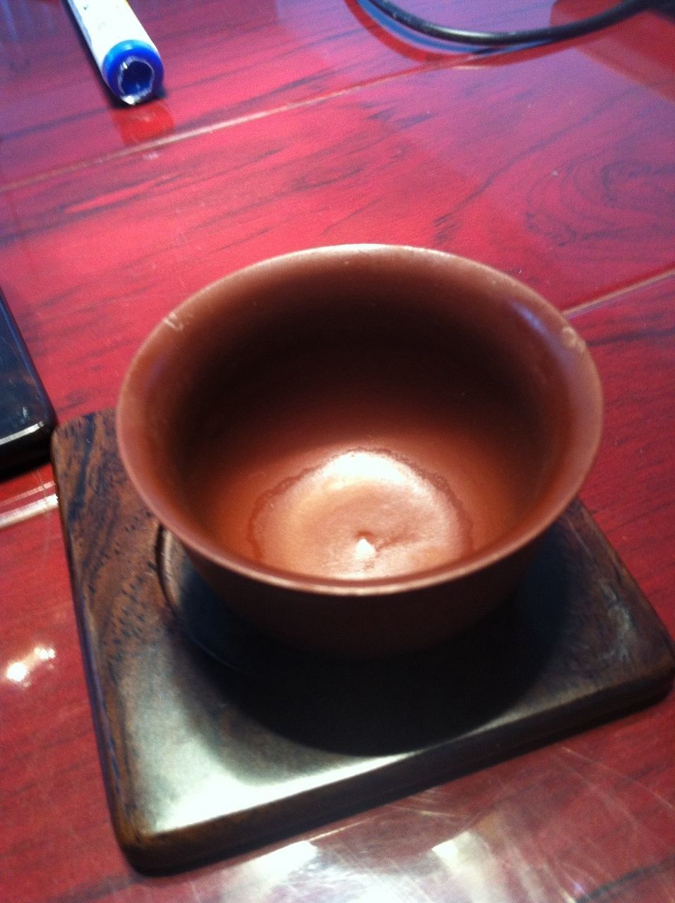 indoors, table, still life, close-up, high angle view, food and drink, drink, wood - material, heat - temperature, coffee cup, no people, spoon, red, saucer, refreshment, cup, freshness, coffee - drink, tea cup, bowl