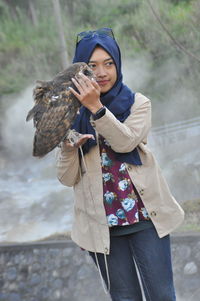 Young woman looking at camera