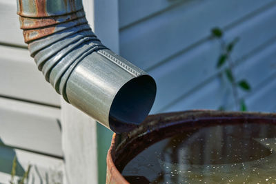 Close-up of woman hand holding pipe