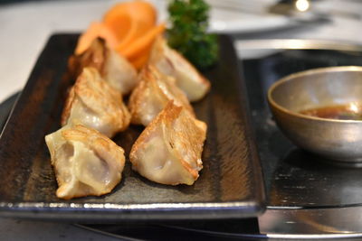 Close-up of served food on table