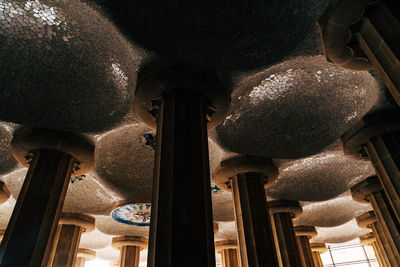 Low angle view of illuminated lights hanging in building